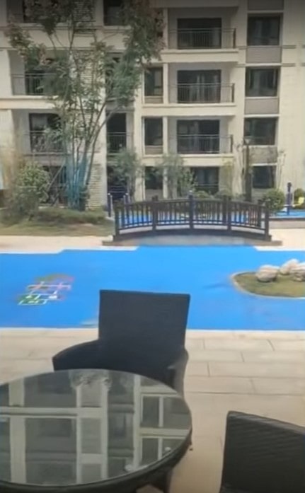 Китайский застройщик пообещал жильцам озеро, а сделал это (5 фото и видео)